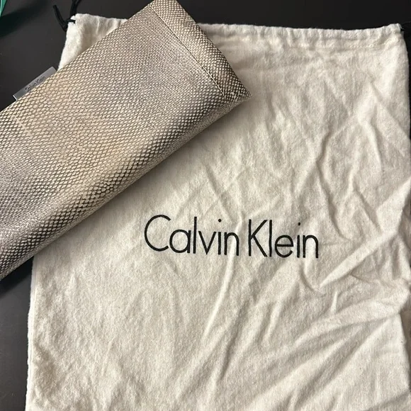 Slim Calvin Klein silver snake print clutch - Picture 13 of 13